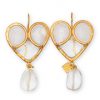 Made from gold-plated brass and copper, the heart-shaped earrings feature hand-poured glass beads and rock crystal.